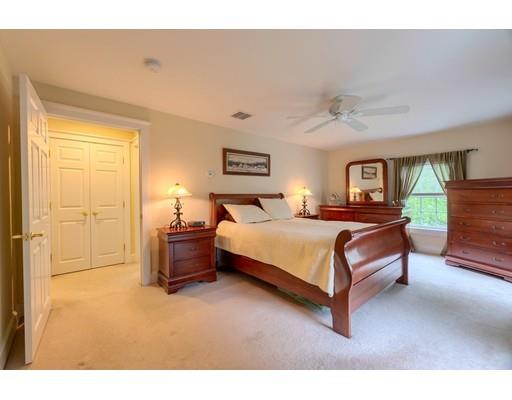 31 Boston Road Chelmsford, MA 01824 - Photo 27 of 42 a spacious bedroom with a bed and a cabinets