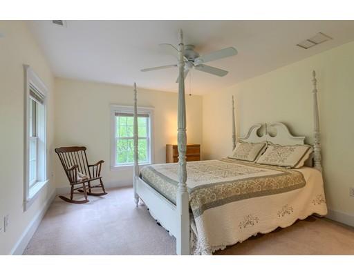 31 Boston Road Chelmsford, MA 01824 - Photo 29 of 42 a bedroom with a bed chair and window