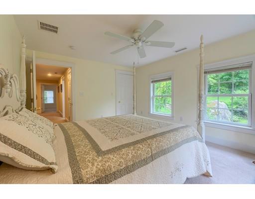 31 Boston Road Chelmsford, MA 01824 - Photo 30 of 42 a bedroom with a bed next to a window