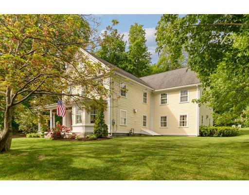 31 Boston Road Chelmsford, MA 01824 - Photo 3 of 42 a view of a white house with a big yard and large trees