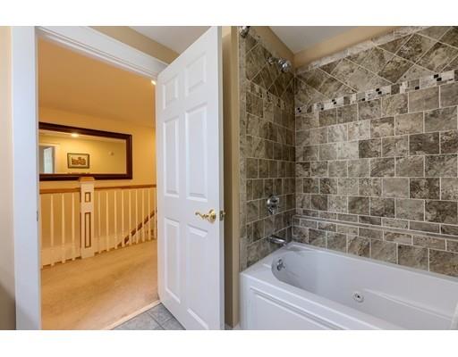 31 Boston Road Chelmsford, MA 01824 - Photo 33 of 42 a bathroom with a bathtub and a shower