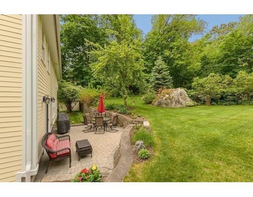 31 Boston Road Chelmsford, MA 01824 - Photo 37 of 42 a view of a backyard with plants and outdoor seating