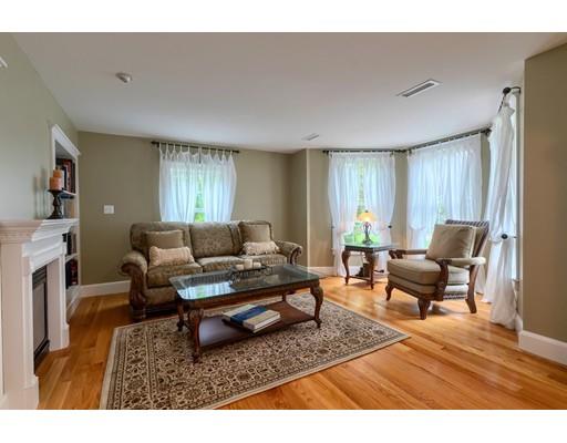 31 Boston Road Chelmsford, MA 01824 - Photo 9 of 42 a living room with furniture a rug and a window