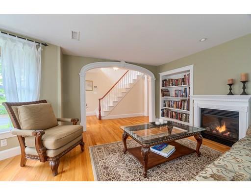 31 Boston Road Chelmsford, MA 01824 - Photo 10 of 42 a living room with furniture and a fireplace