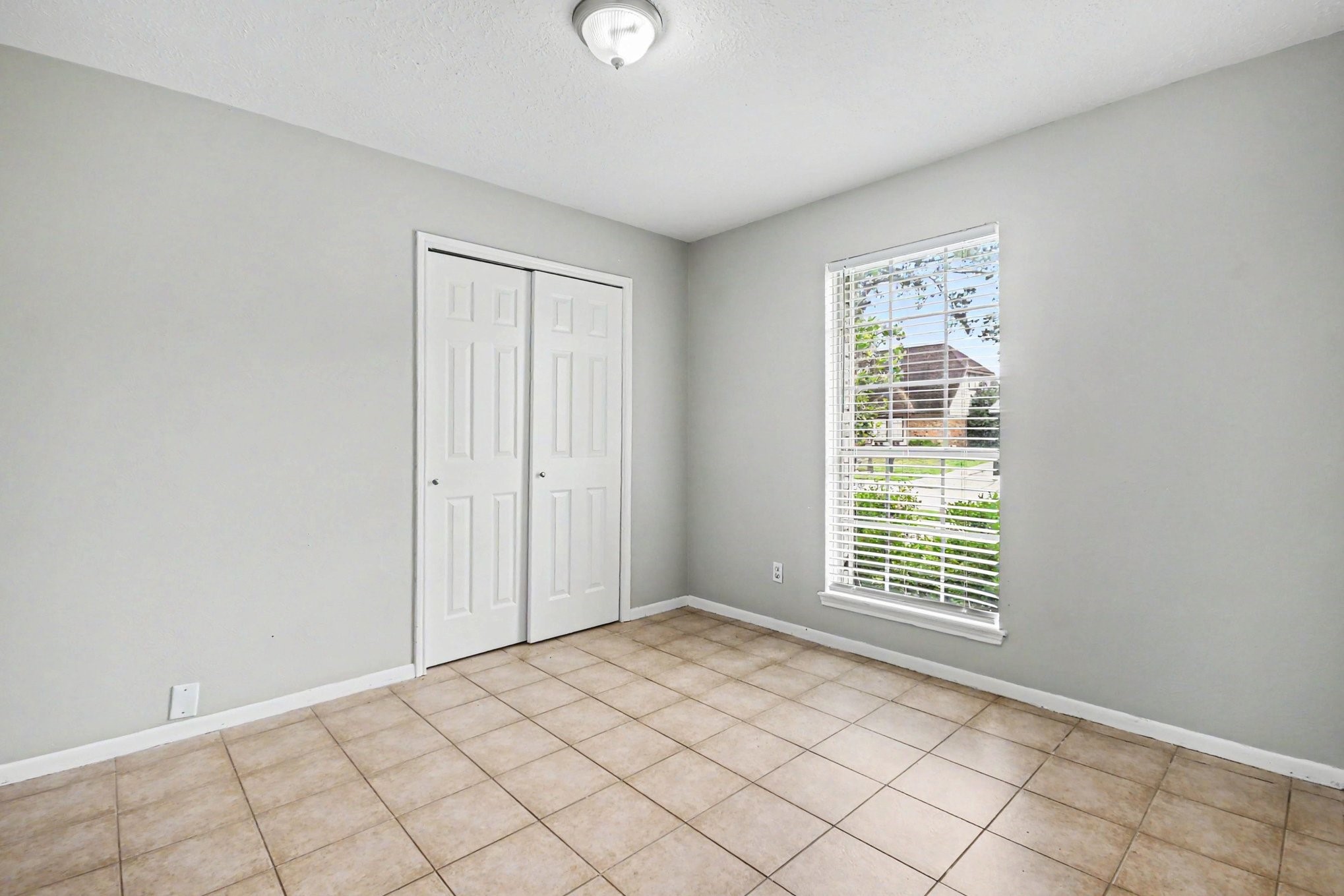 4306 Oneida Street Pasadena, TX 77504 - Photo 16 of 23 a view of an empty room with window