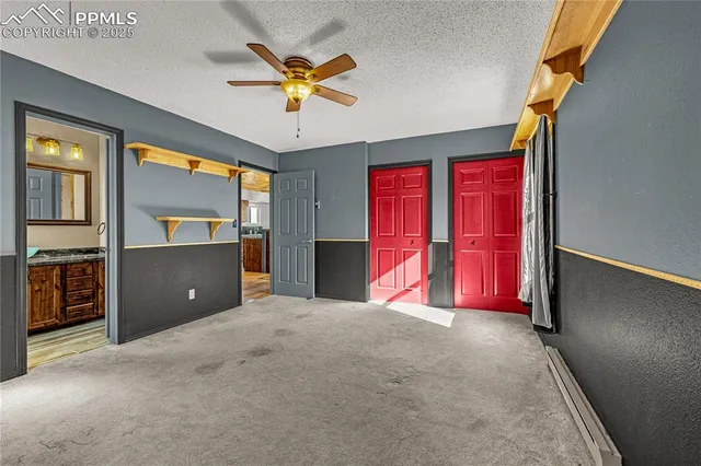 a living room with furniture wooden floor and a fireplace