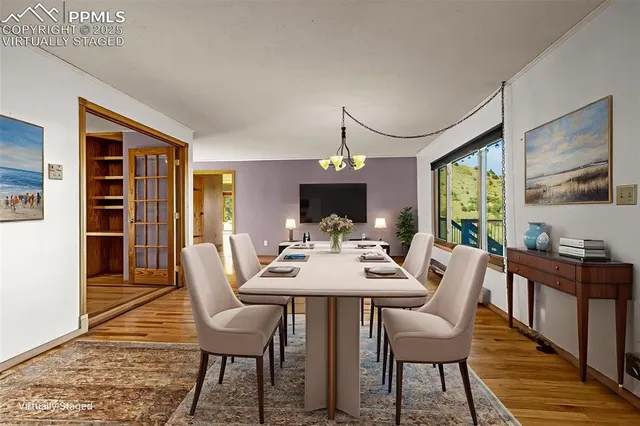 a view of a dining room with furniture