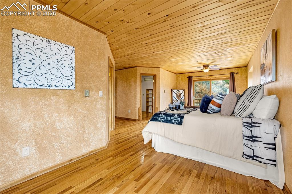 845 Crystal Park Road Manitou Springs, CO 80829 - Photo 23 of 50 a living room with furniture and a wooden floor