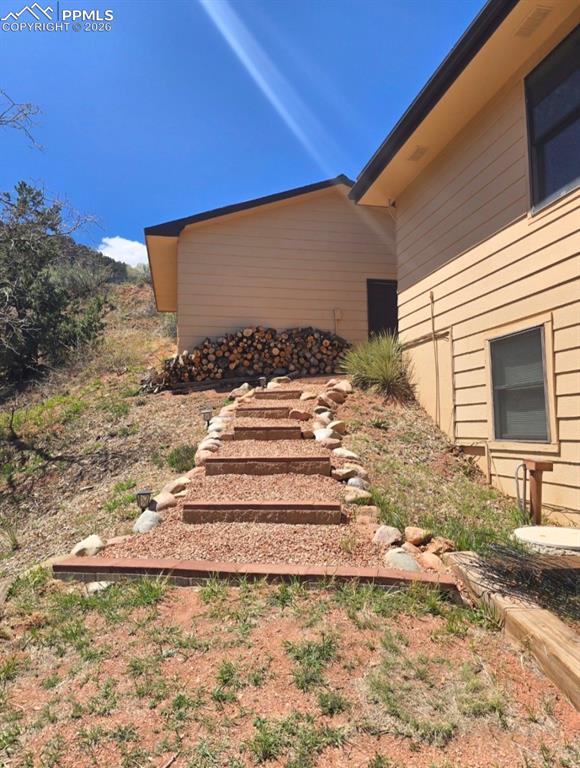 845 Crystal Park Road Manitou Springs, CO 80829 - Photo 49 of 50 a view of a backyard of the house