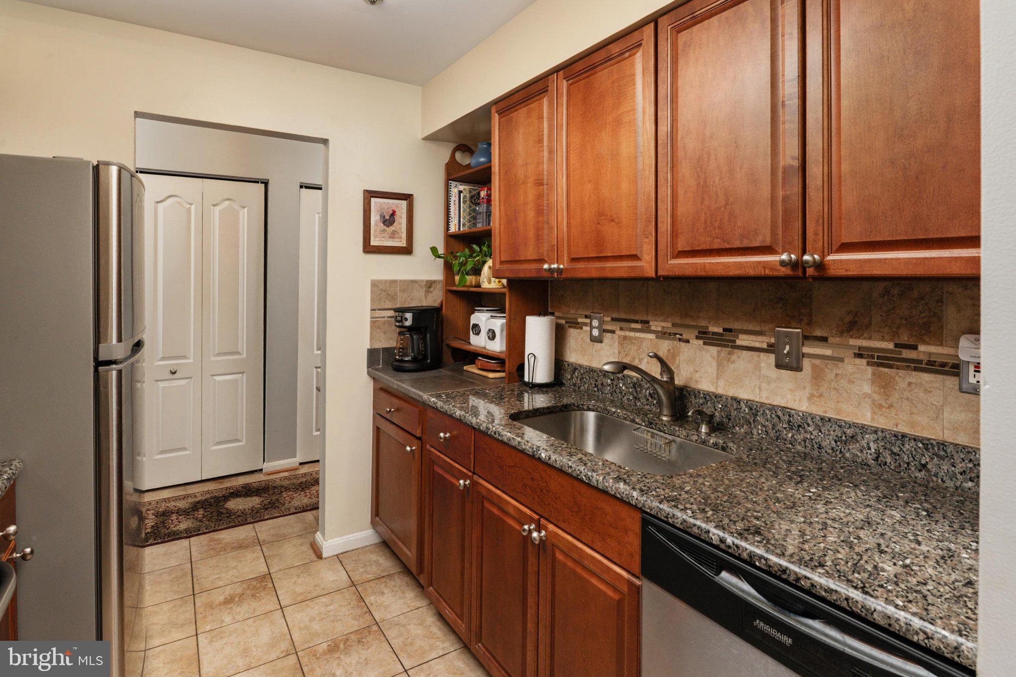8337 Montgomery Run Road, Unit C Ellicott City, MD 21043 - Photo 11 of 24 Kitchen with pantry closet
