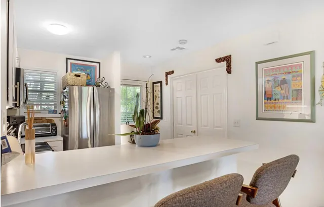a view of a living room with furniture