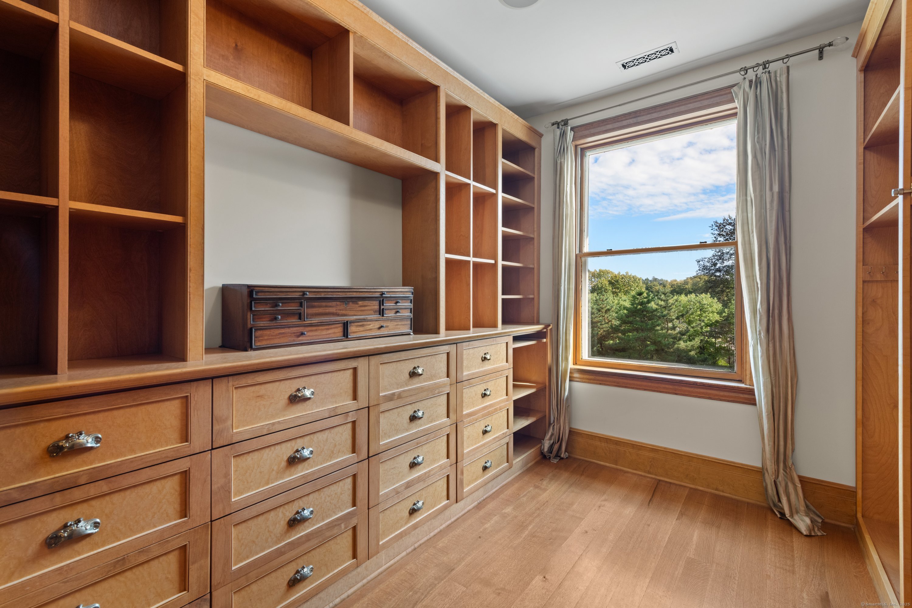 249 Greens Farms Road Westport, CT 06880 - Photo 26 of 40 a view of room with window and cabinet