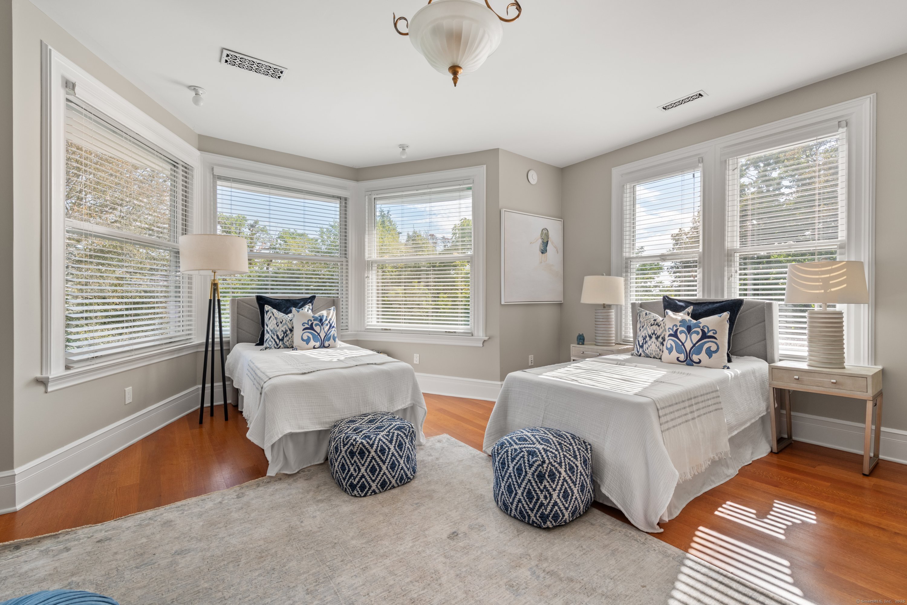 249 Greens Farms Road Westport, CT 06880 - Photo 29 of 40 a bedroom with two beds and a large window
