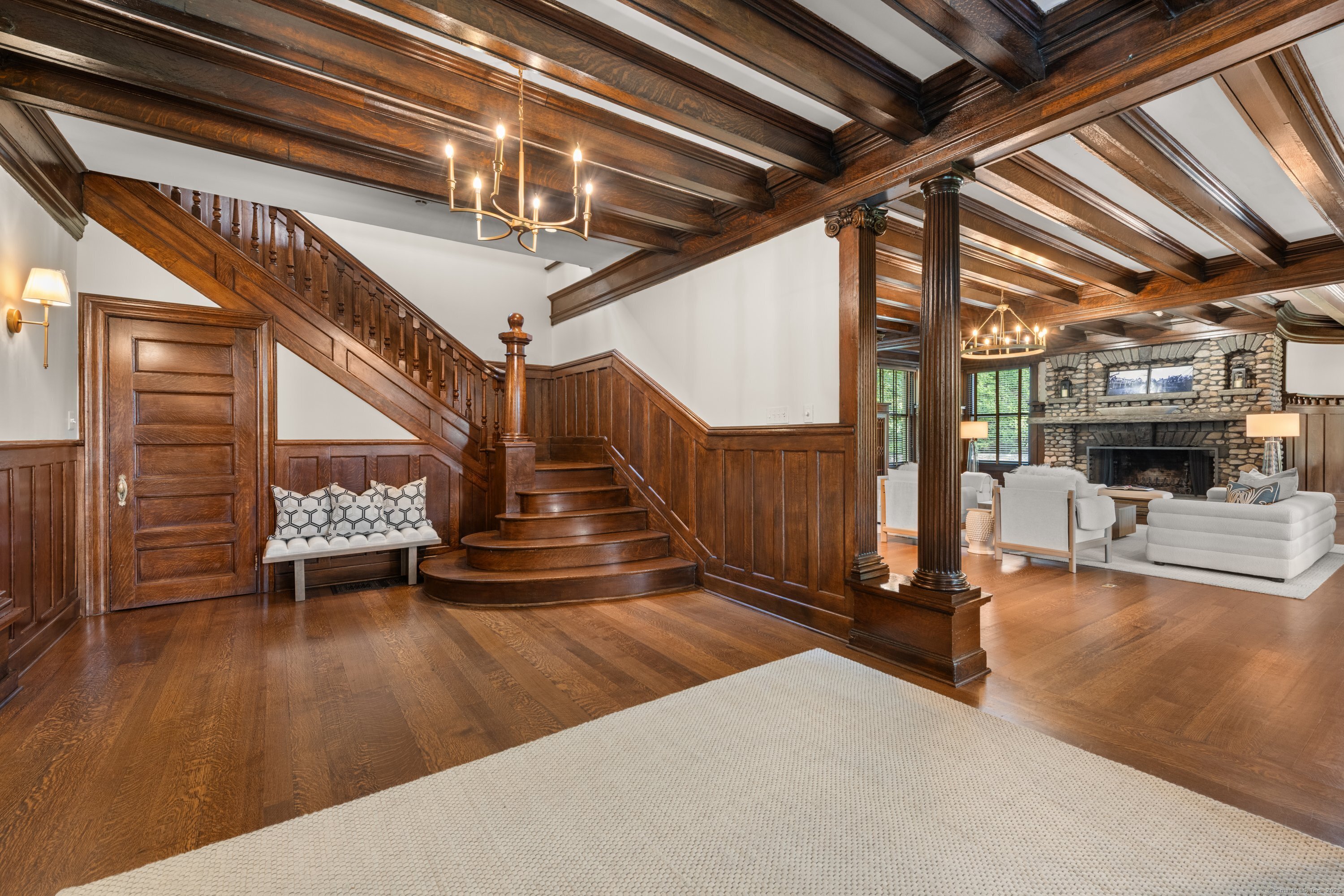 249 Greens Farms Road Westport, CT 06880 - Photo 3 of 40 a view of livingroom with furniture wooden floor and windows