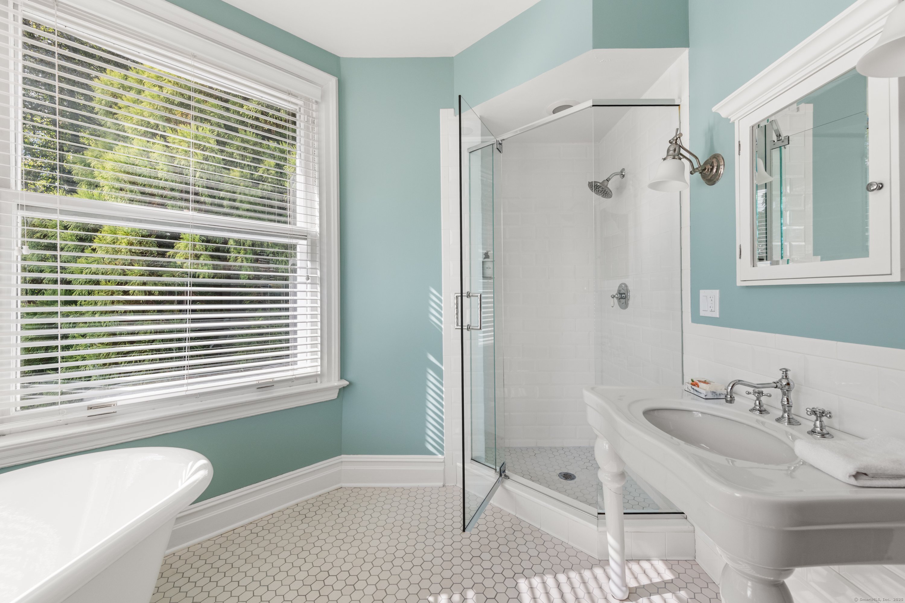 249 Greens Farms Road Westport, CT 06880 - Photo 33 of 40 a bathroom with a granite countertop sink and a bathtub