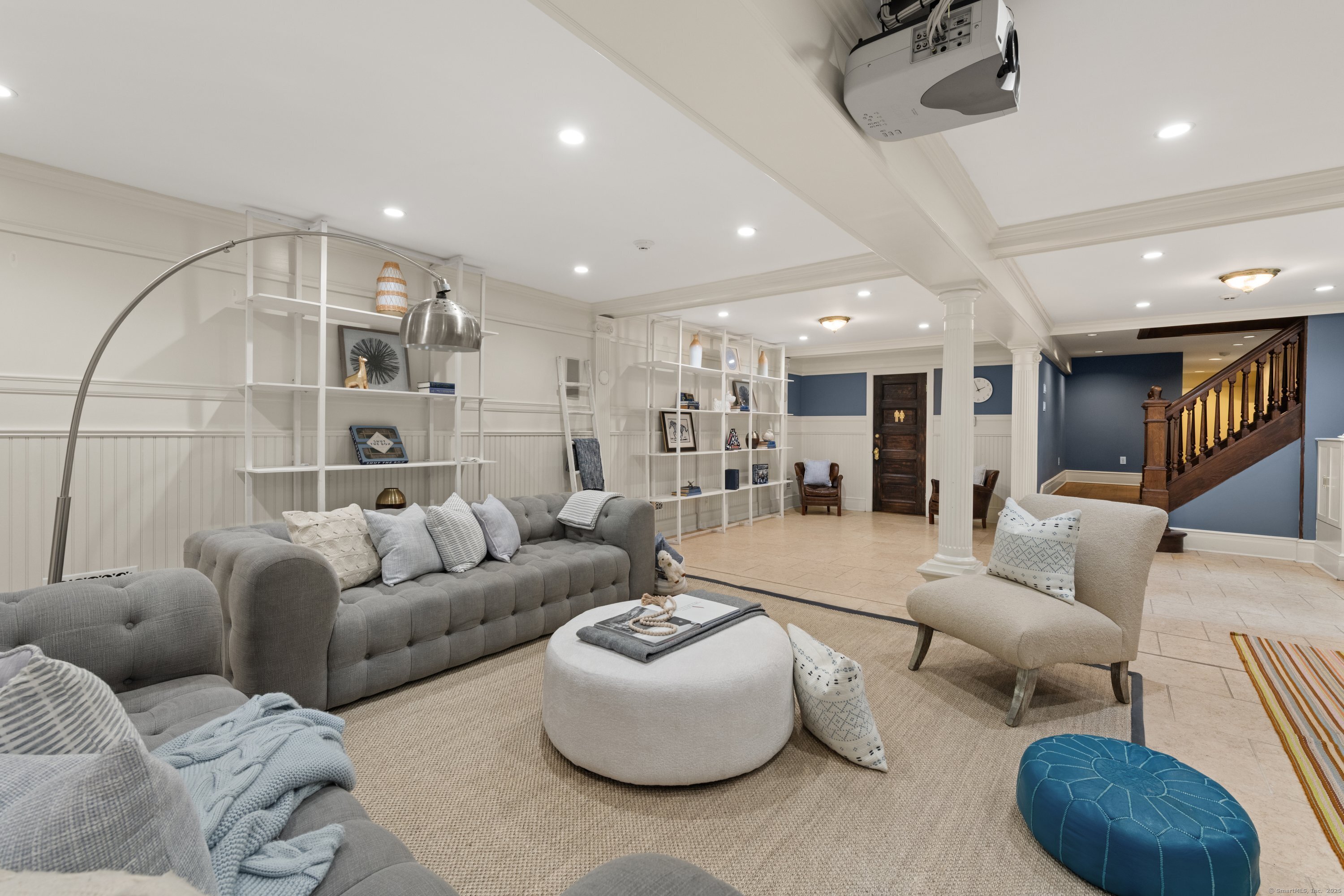 249 Greens Farms Road Westport, CT 06880 - Photo 33 of 40 a living room with furniture kitchen view and a chandelier