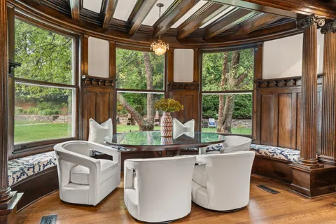 a living room with large windows