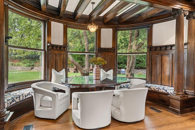 a living room with large windows