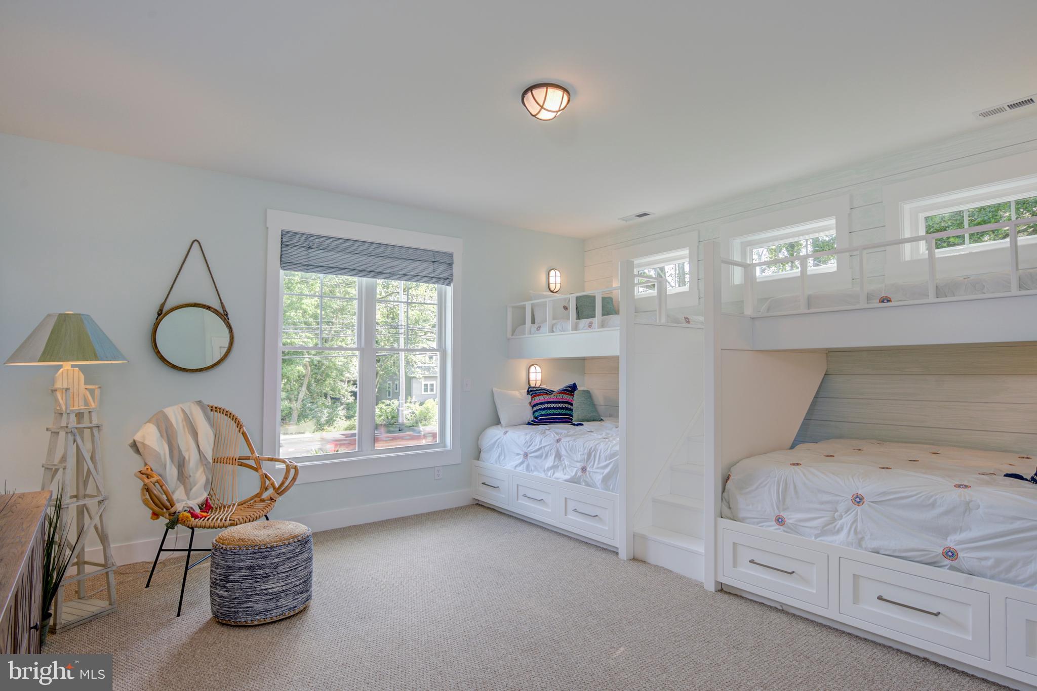 52 Turtle Run Bethany Beach, DE 19930 - Photo 7 of 18 a bedroom with furniture and a window