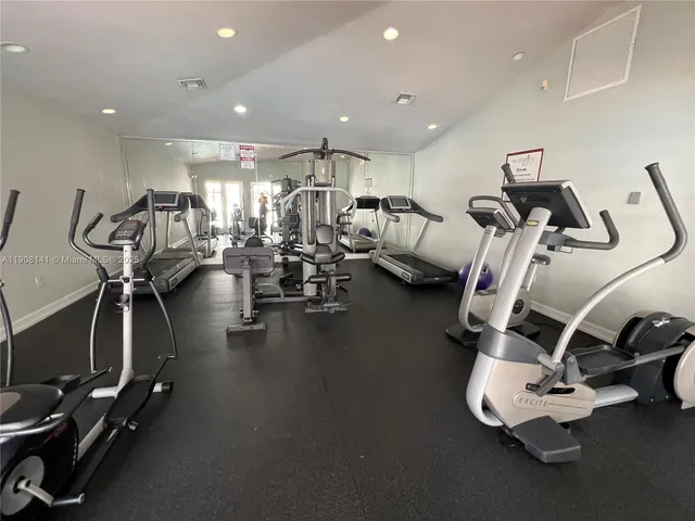 a view of a room with gym equipment