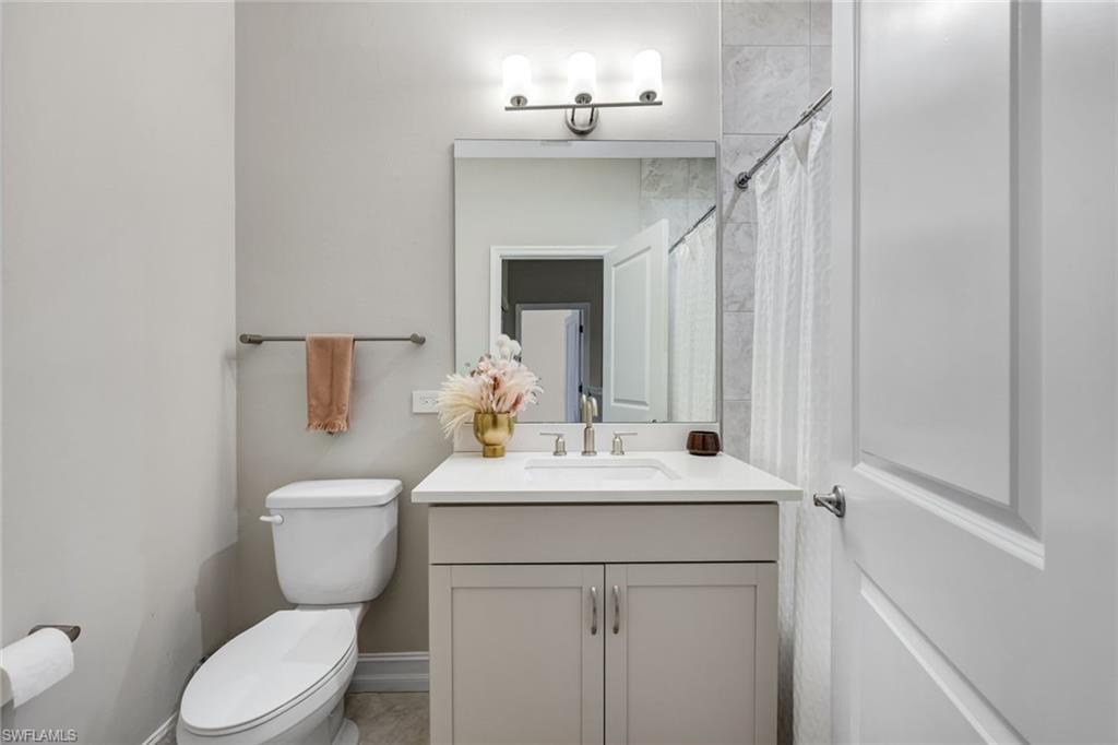 7348 Rockefeller Drive Naples, FL 34119 - Photo 21 of 39 Bathroom #2 - Featuring a Shower / Tub Combo