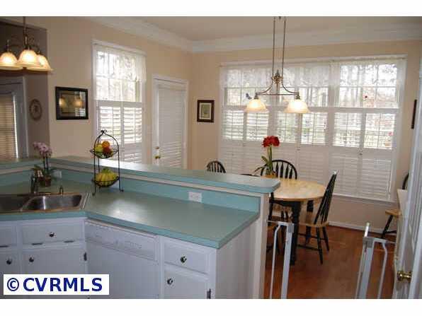 13700 Laurel Spring Road Chester, VA 23831 - Photo 10 of 10 Other - Breakfast nook w/plantation shutters overlooking deck & bkyd