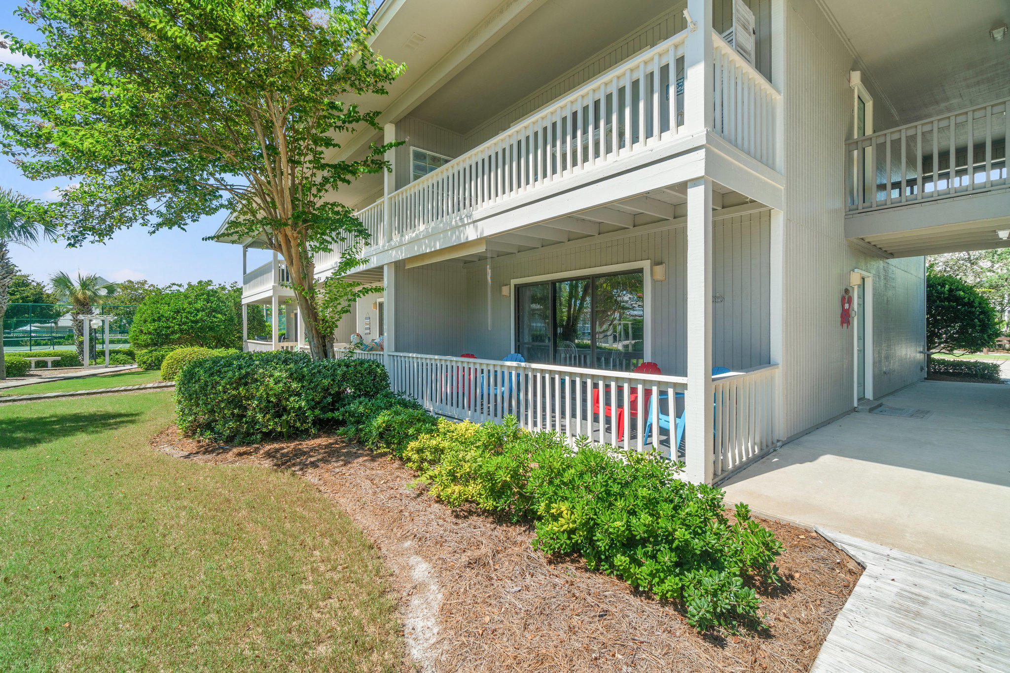 3799 East County Highway 30A, Unit E6 Santa Rosa Beach, FL 32459 - Photo 18 of 23 a view of a house with a yard