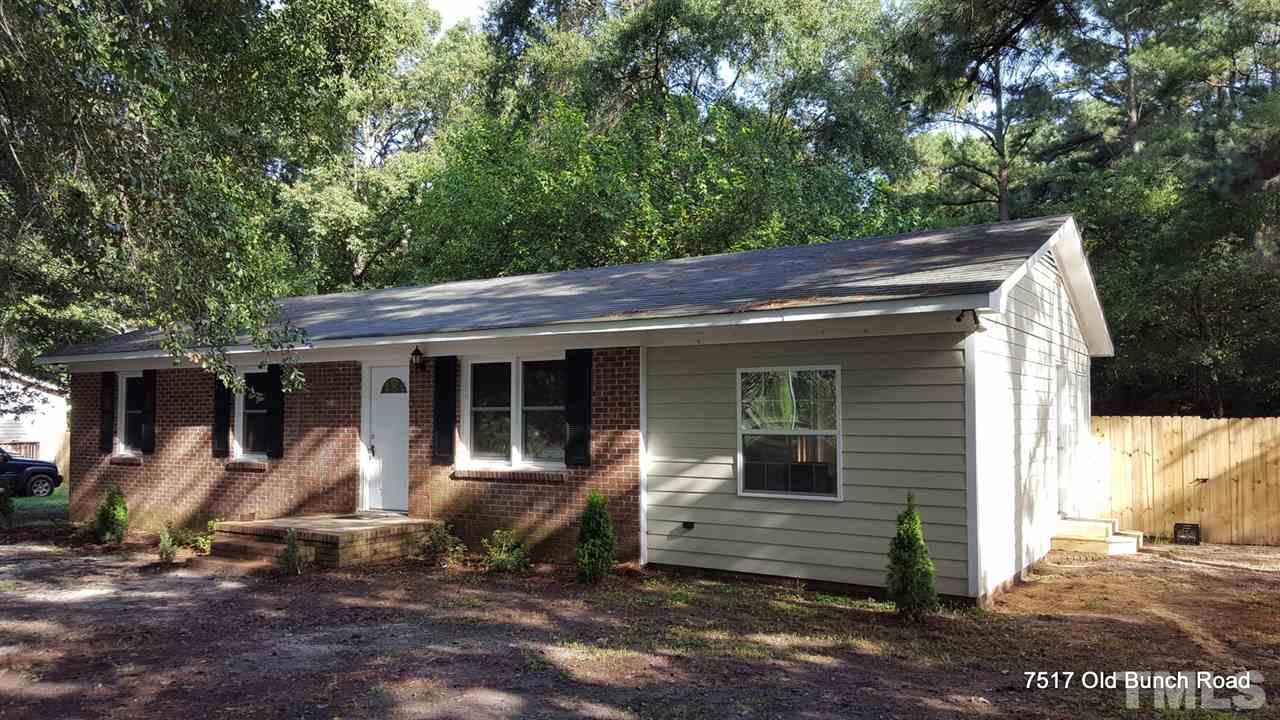 7517 Old Bunch Road Zebulon, NC 27597 - Photo 2 of 25 a view of a house with a patio