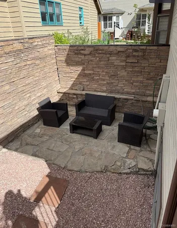a view of a terrace with chairs