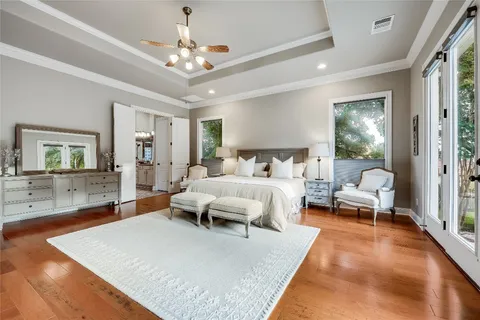 a bed room with a bed window and a couch