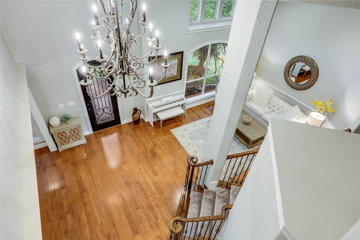 2116 Demona Drive Austin, TX 78733 - Photo 18 of 40 a view of entryway and hall with wooden floor