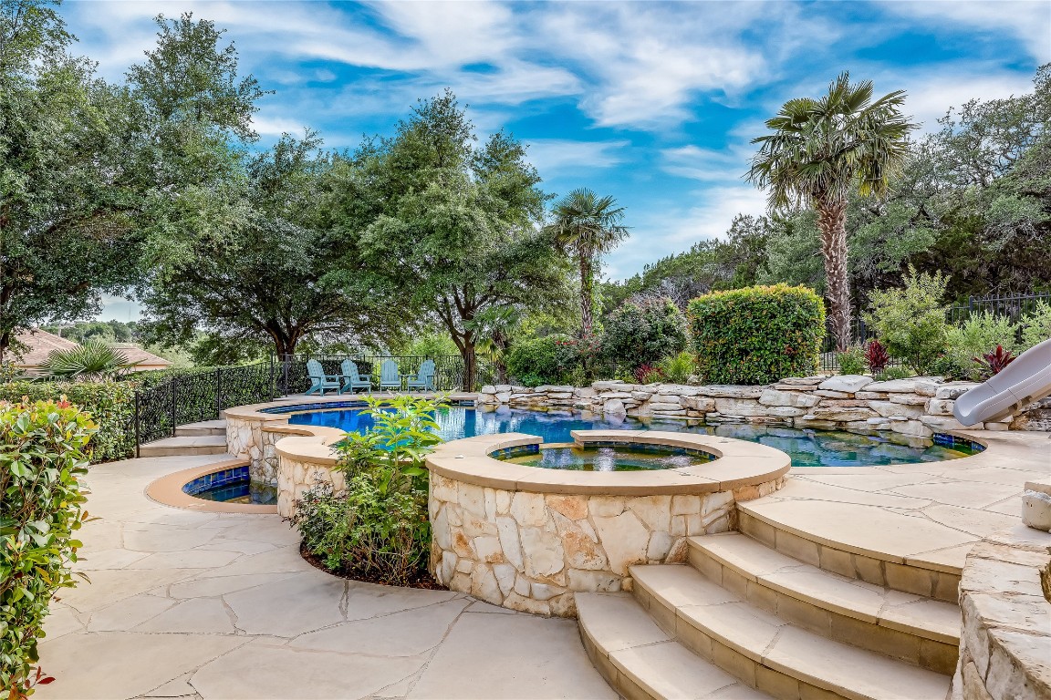 2116 Demona Drive Austin, TX 78733 - Photo 27 of 40 a view of a backyard with sitting area