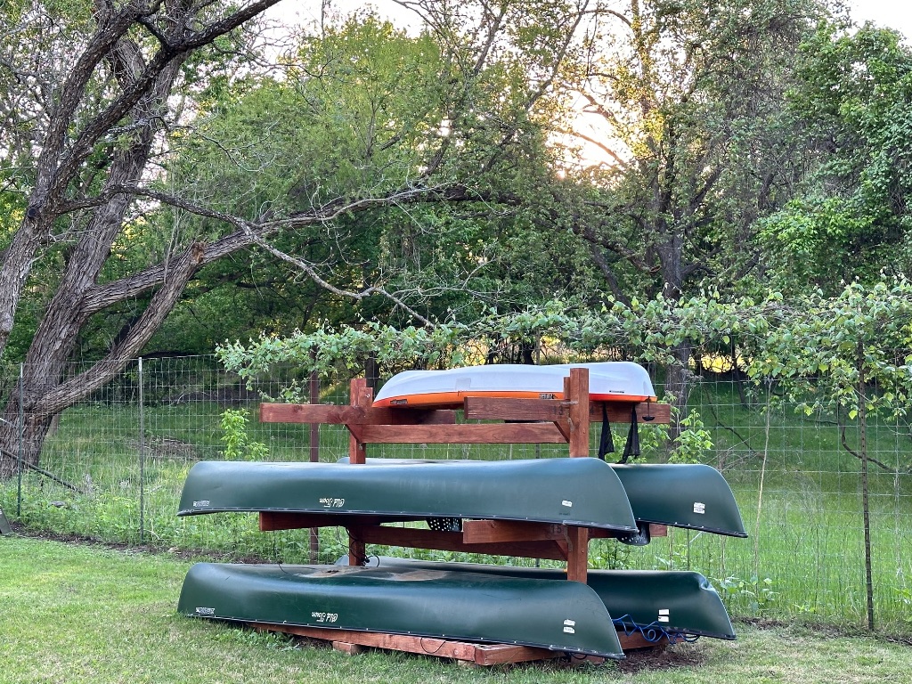 2116 Demona Drive Austin, TX 78733 - Photo 39 of 40 a view of an outdoor sitting area with brick walls