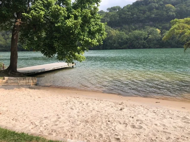 a view of a backyard of the house