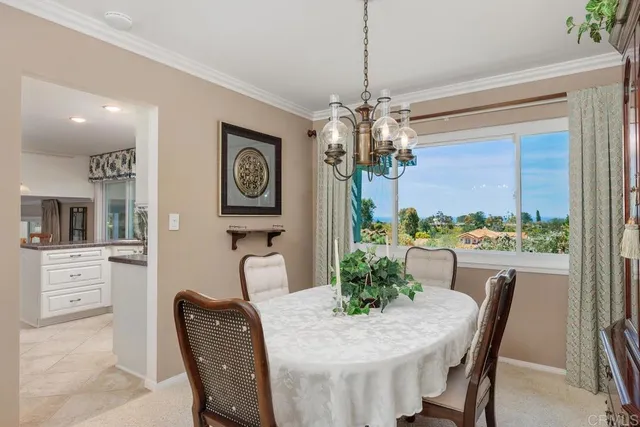a kitchen with granite countertop a sink and cabinets