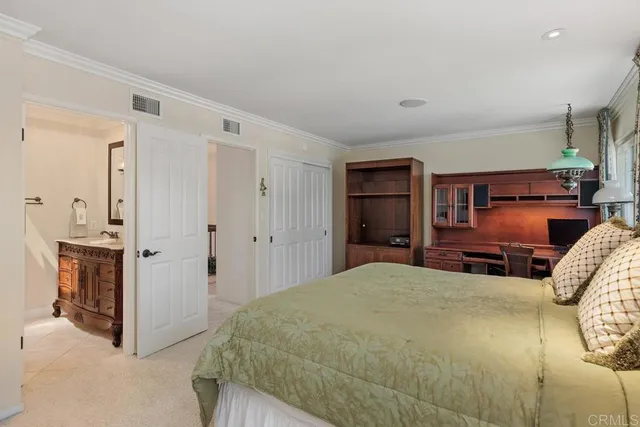a bathroom with a sink double vanity and a mirror