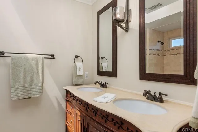 a view of storage and utility room with washer and dryer