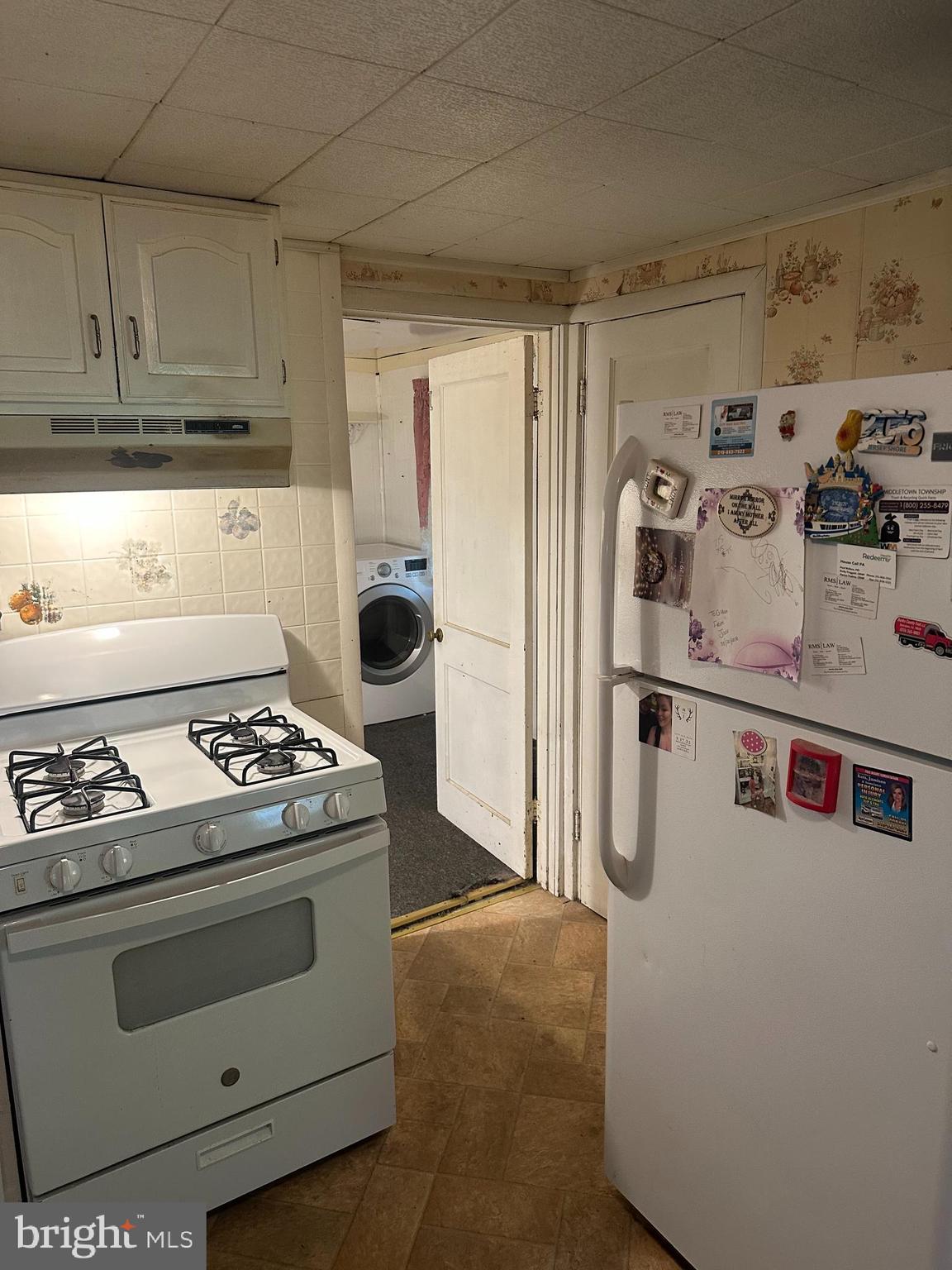 1516 Fairview Avenue Langhorne, PA 19047 - Photo 8 of 26 a kitchen with stainless steel appliances granite countertop a refrigerator and a stove