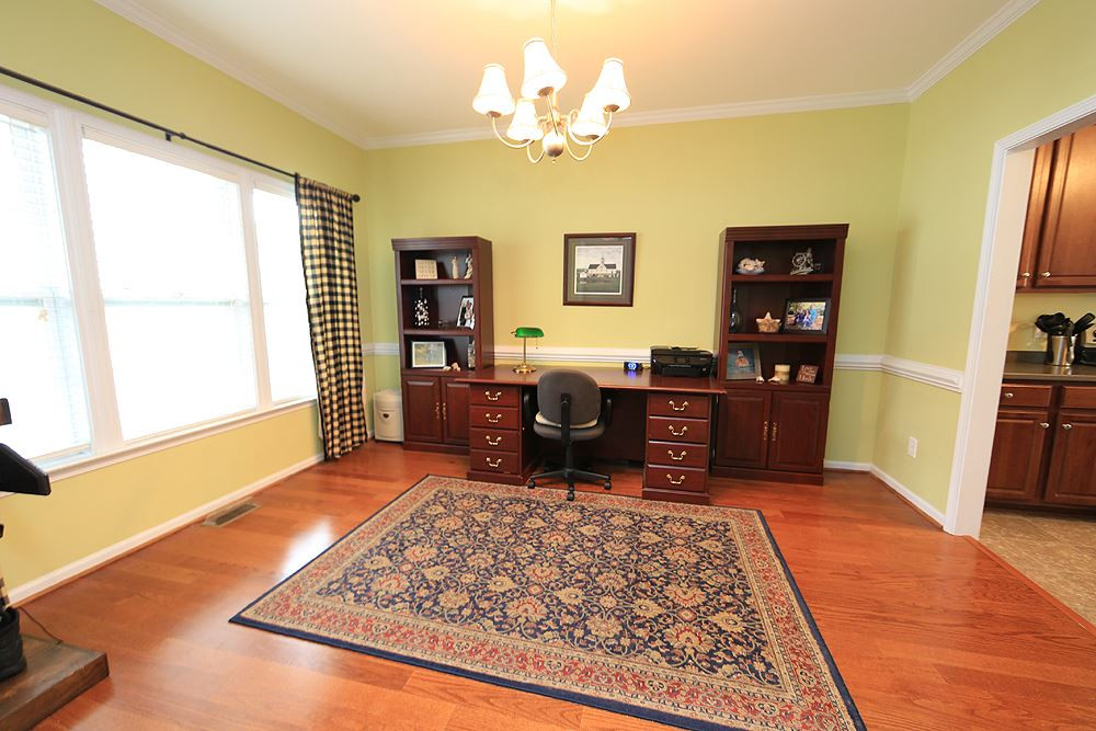 5904 Shedd Drive Raleigh, NC 27603 - Photo 20 of 25 Dining room is located at the front of the house and is currently being used as an office. Dining Room