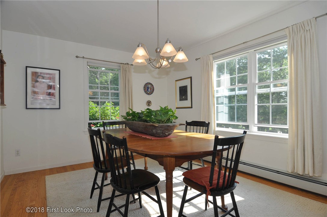 15 Blue Ridge Drive Charlestown, RI 02813 - Photo 13 of 36 Plenty of natural light accentuates hardwood floors.