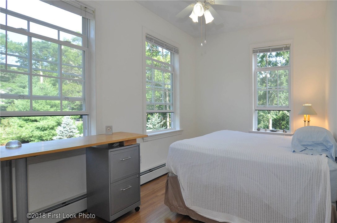 15 Blue Ridge Drive Charlestown, RI 02813 - Photo 21 of 36 Second bedroom has brand new hardwood floors.