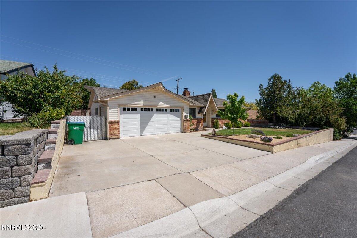 2205 Carlin Street Reno, NV 89503 - Photo 2 of 51 a view of a swimming pool with a yard