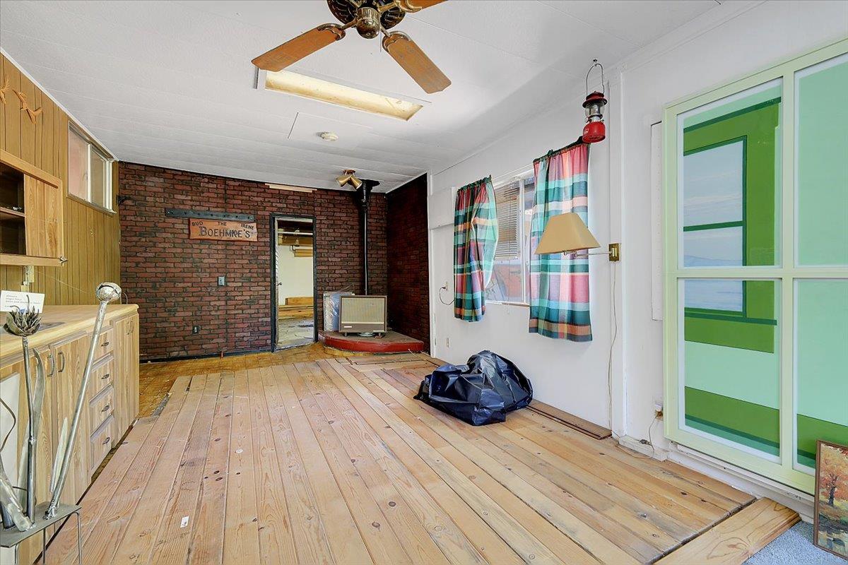 2060 Locust Street Sutter, CA 95982 - Photo 27 of 61 STEP DOWN "SUNROOM" WITH GARAGE ACCESS AND BACKYARD ACCESS