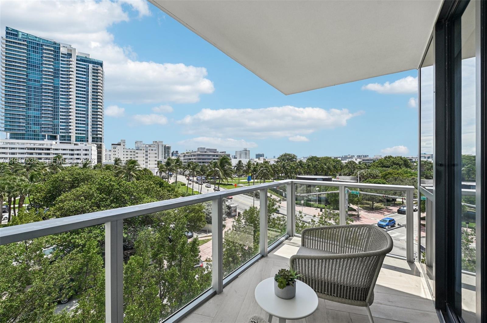 2201 Collins Avenue, Unit 401 Miami Beach, FL 33139 - Photo 6 of 20 a view of a city from a balcony