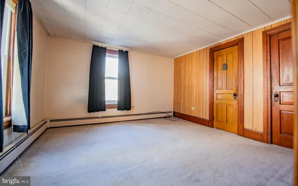 an empty room with windows