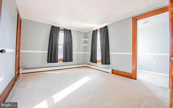 an empty room with windows