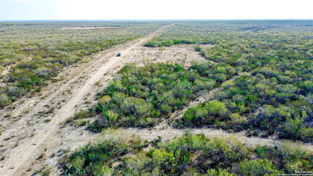 a view of a yard with an outdoor space