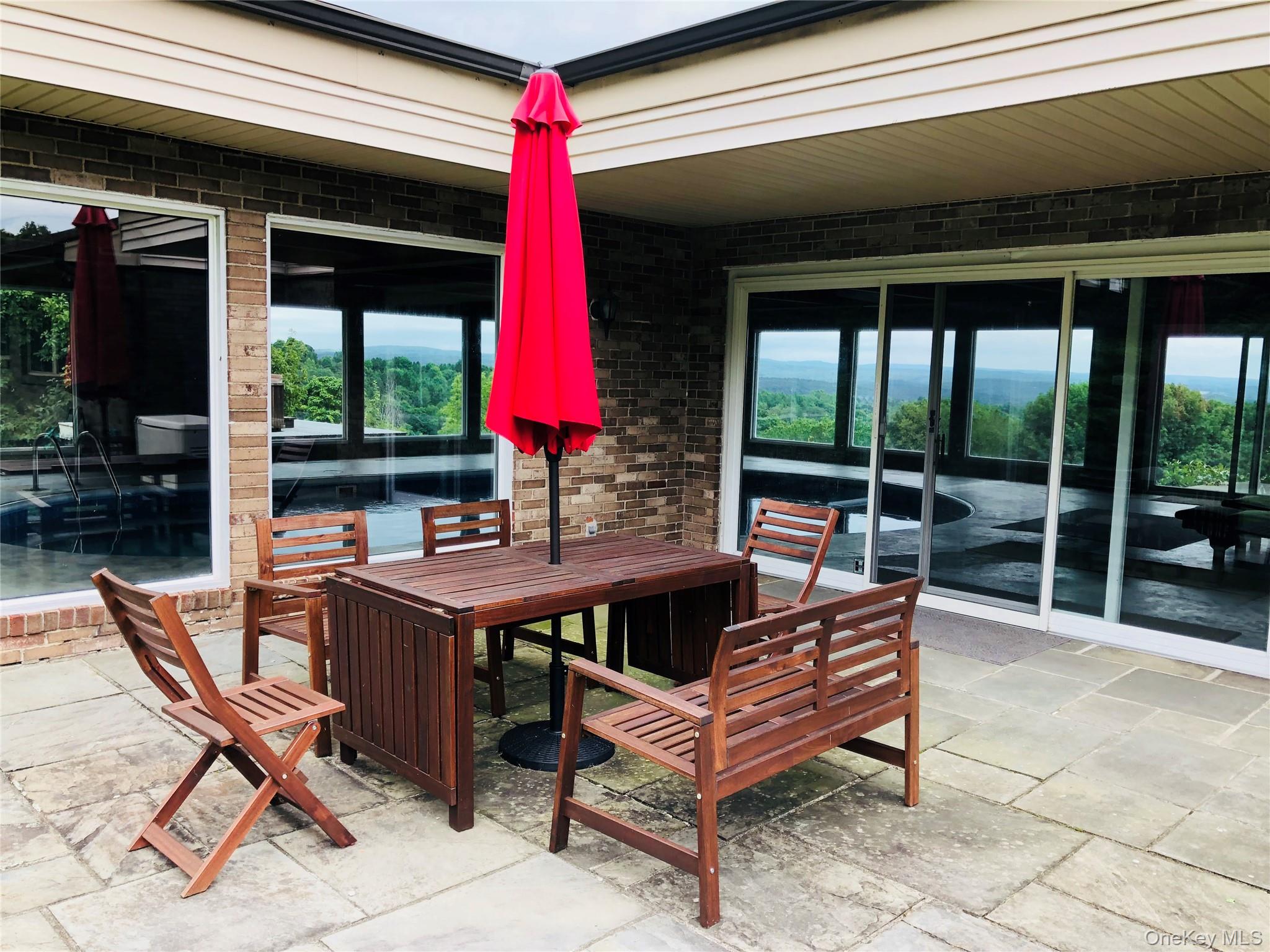 68-78 Ridge Road Clinton Corners, NY 12514 - Photo 33 of 50 a view of a chairs and table in a patio