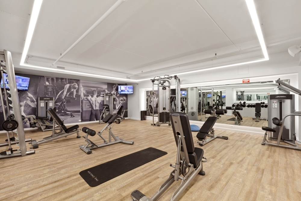 160 West 24th Street, Unit 14K Manhattan, NY 10011 - Photo 9 of 11 a view of a room with gym equipment