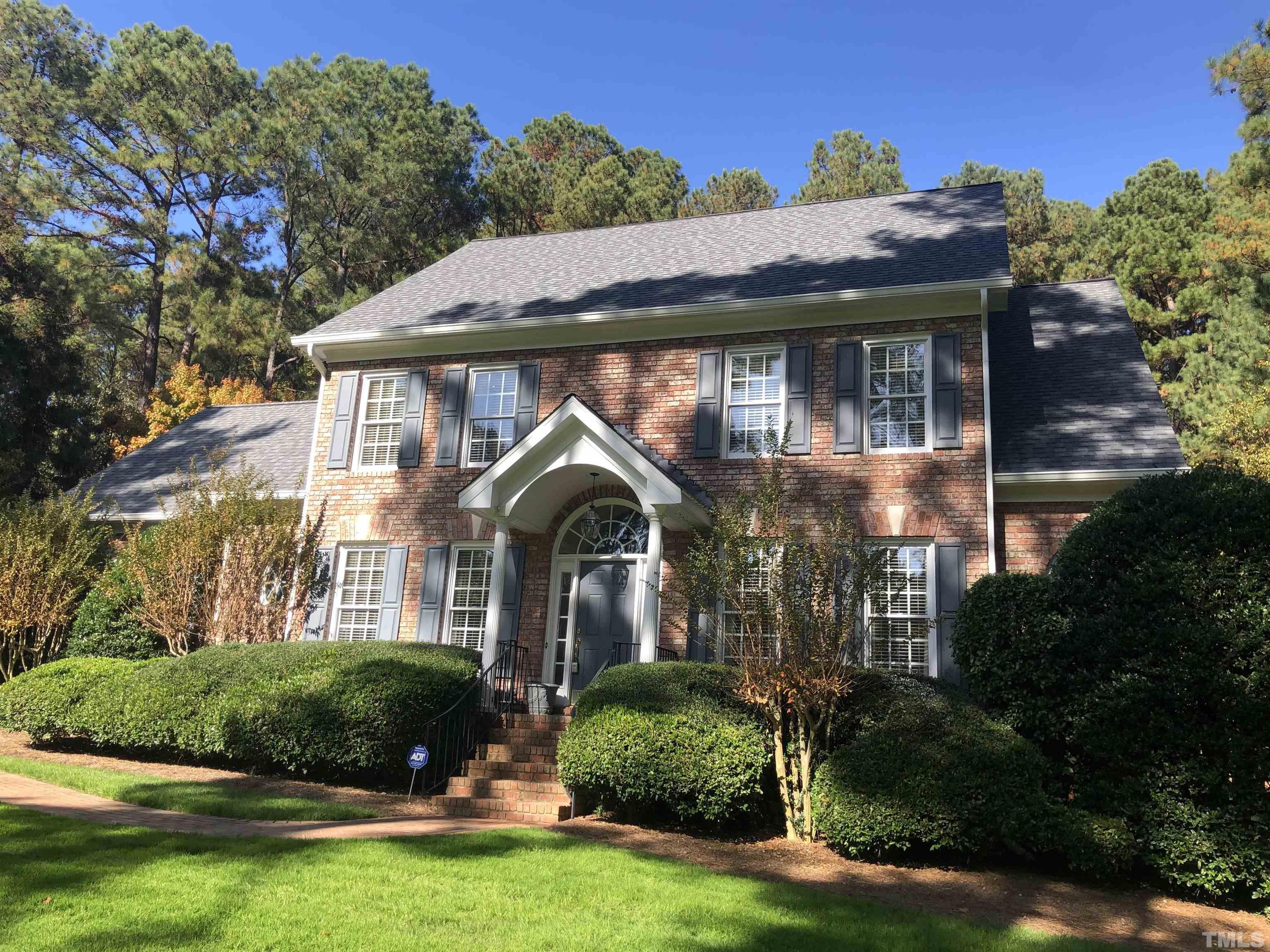 1024 White Crane Way Raleigh, NC 27615 - Photo 1 of 30 a front view of a house with a yard